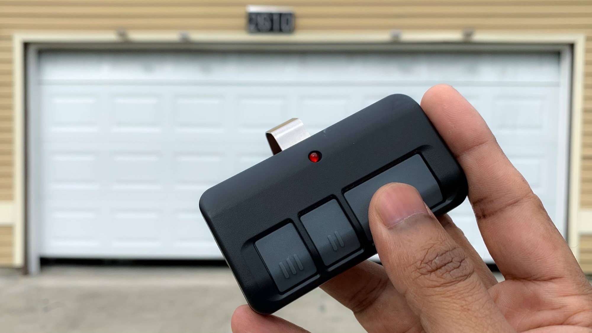 Garage door remote and keypad programming