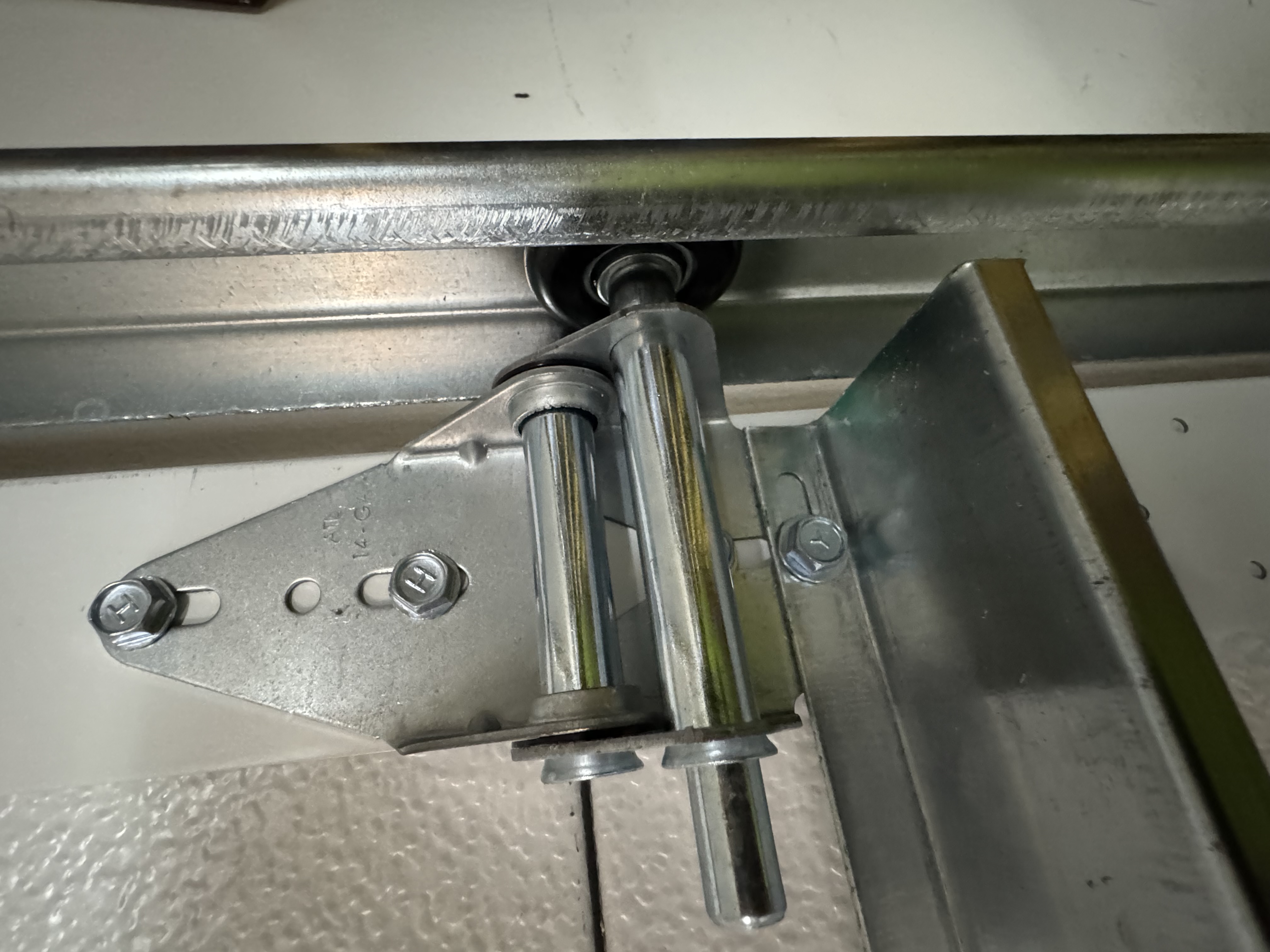 Garage door roller and hinge replacement