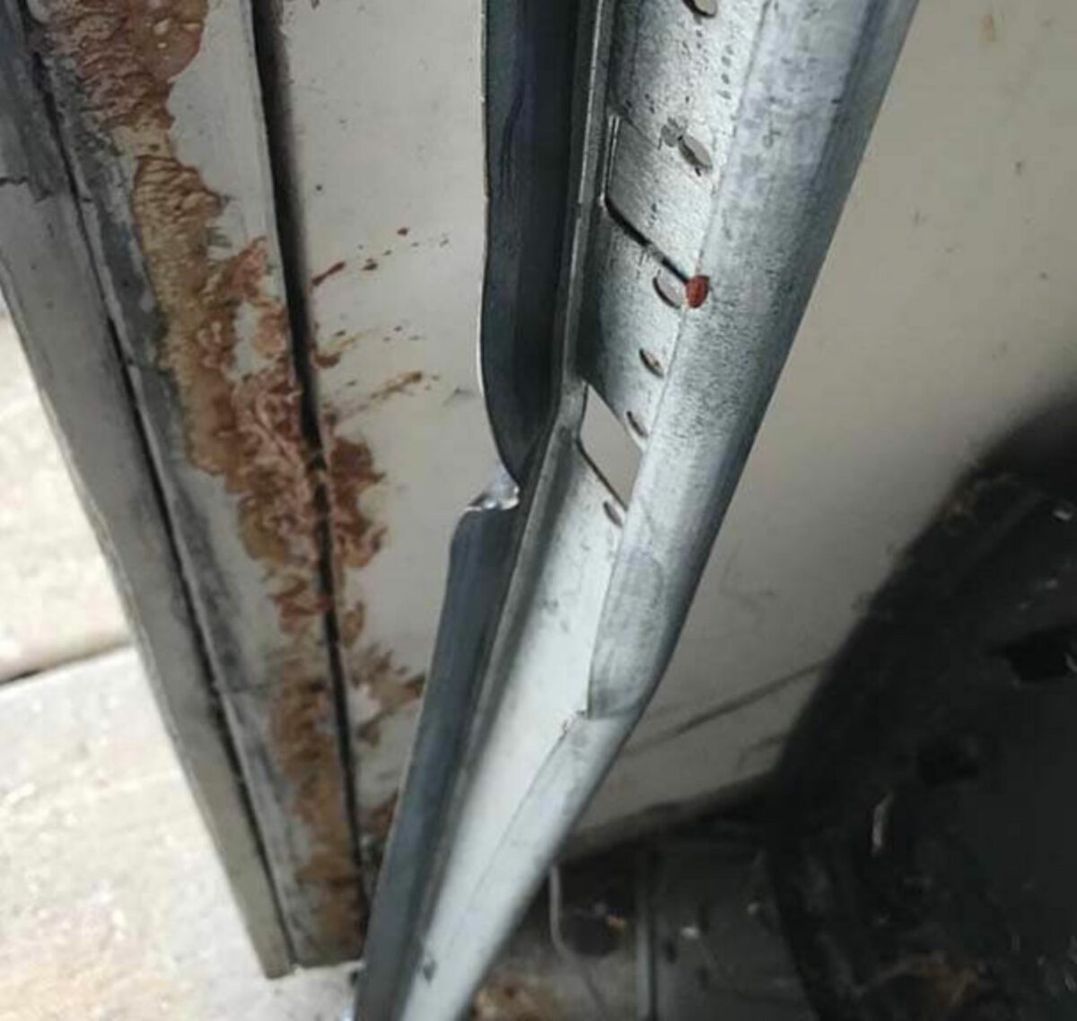 Garage door track repair